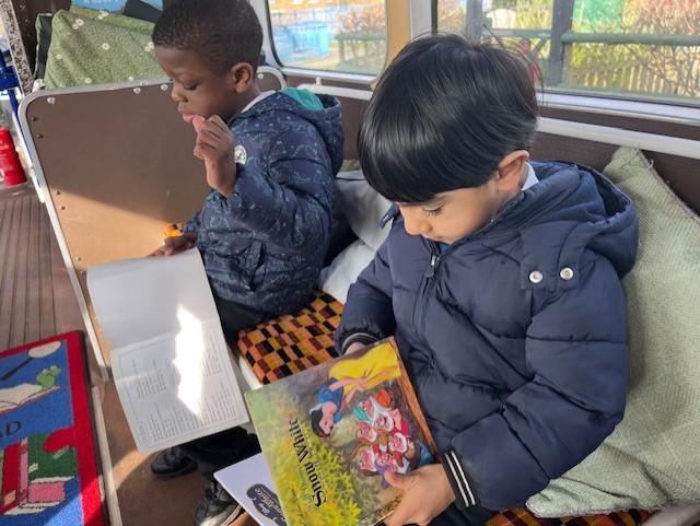 We were reading on the library bus. 