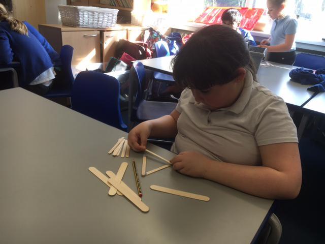 Louisa is busy building her pyramid!