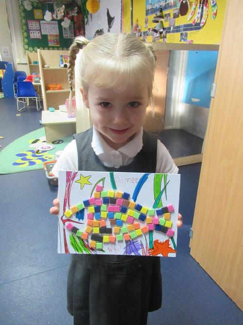 Aimee showed us the mosaic fish she made at home.