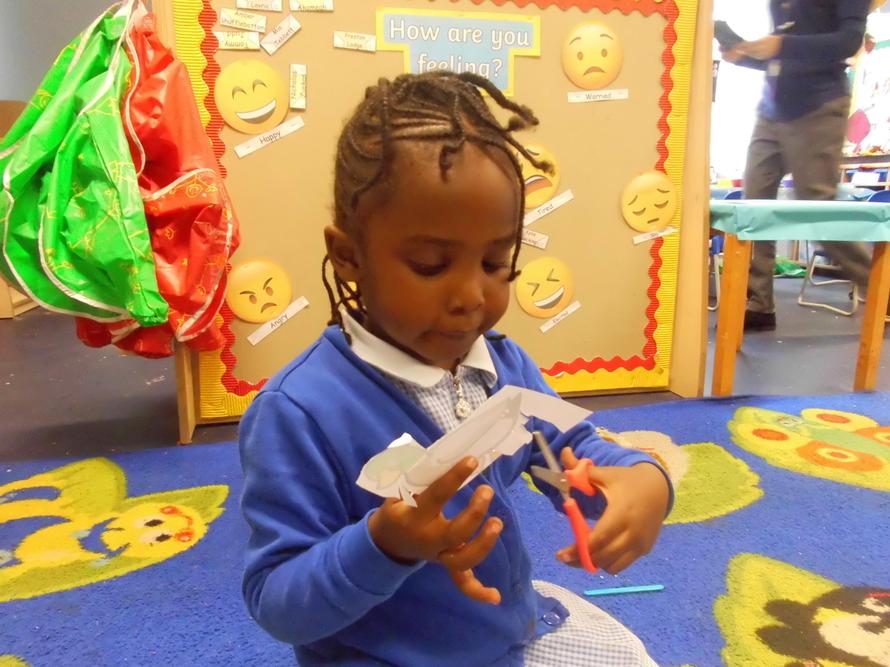 Lyndsey making a puppet