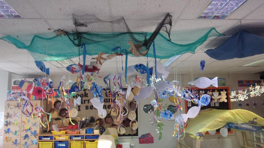 Our immersive hanging sea aquarium displaying all of our creative creations.