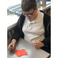 We practised moulding clay by using playdough.
