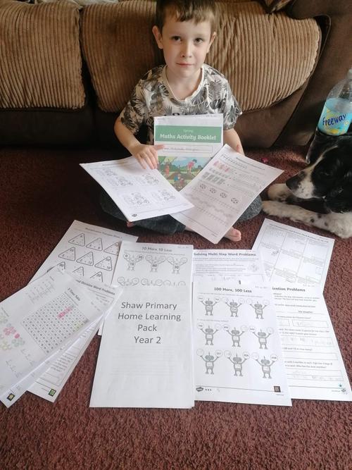 Mitchell has been busy completing his work packs!