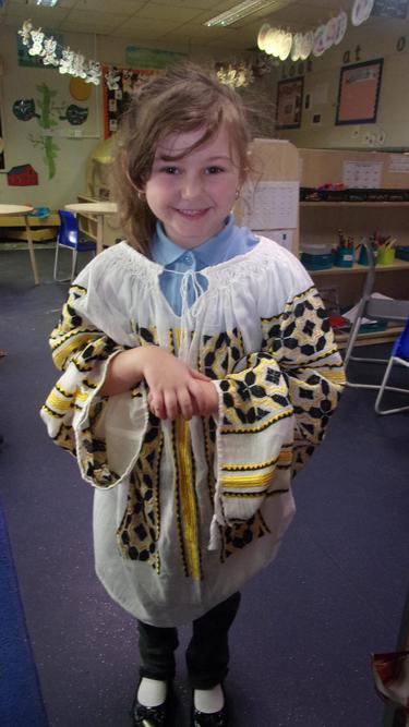 We looked at Romanian books and tried on some Romanian clothes. 