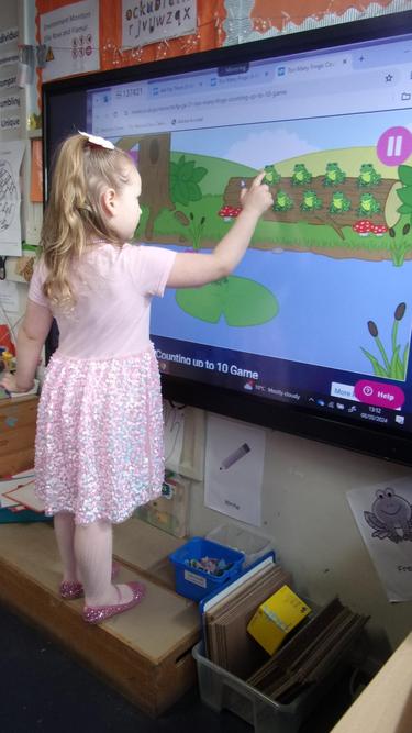 Barbie (Olive) practising her maths skills!