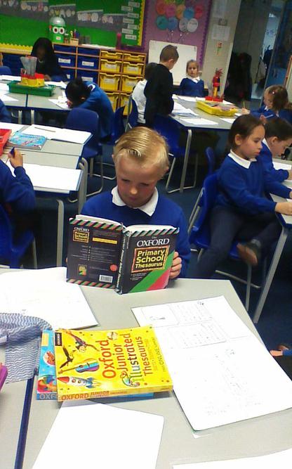 Dennis using a dictionary. 