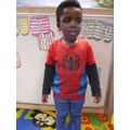 'I'm black spiderman,i shoot someone and catch them' (shows shooting a web with his hands)