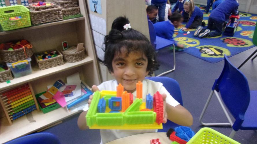 Sanaya has been building using the stickle bricks