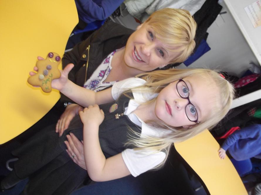 Amy and her mum showing off their biscuit!