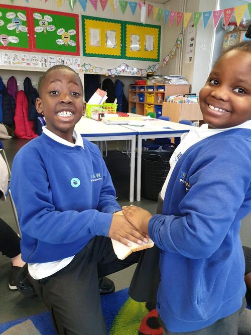 Dirty hands on fresh bread.