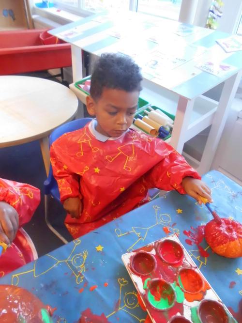 Montell enjoyed using the paints to paint pumpkins
