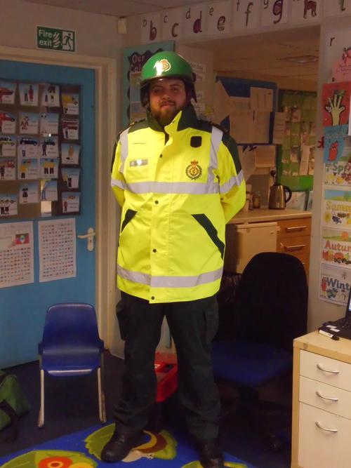 Ross the paramedic wears a yellow coat