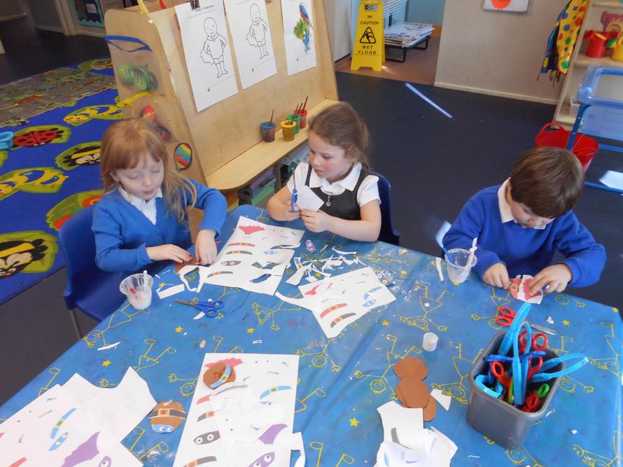The children cut out shapes to make a Supertato
