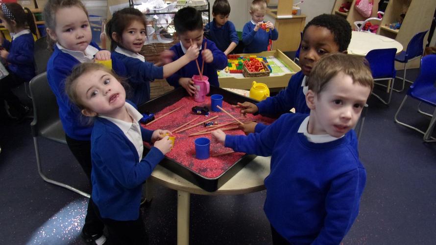 We played with red rice and chopsticks
