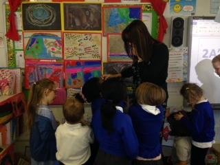 Mrs Copping was looking at the art pictures. 