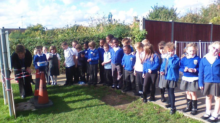 Class 2A are burying our time capsule!