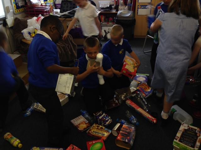 We used recycled items to make a boat. 